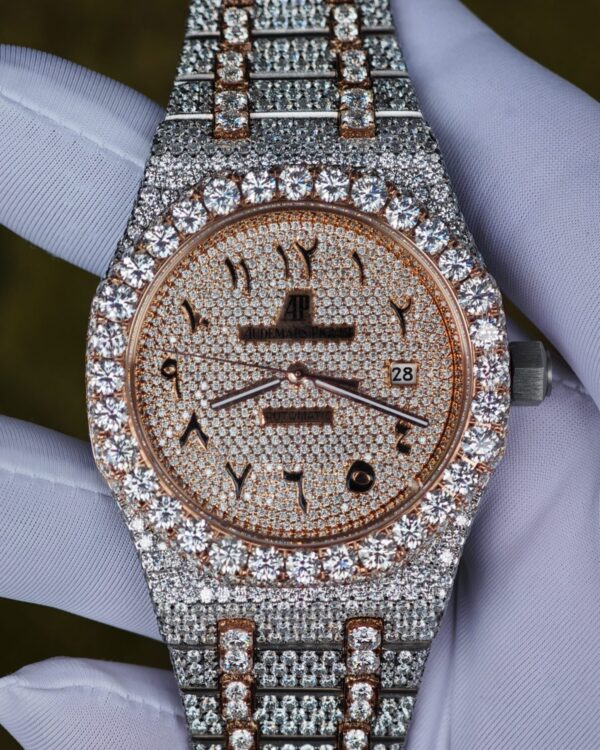 Customized rose gold color scheme with full diamond Audemars Piguet AP15400, the case and strap are handcrafted with natural diamonds using Swiss craftsmanship, a customized full diamond Middle Eastern digital dial, and the best 3120 integrated movement. — custom-built watch