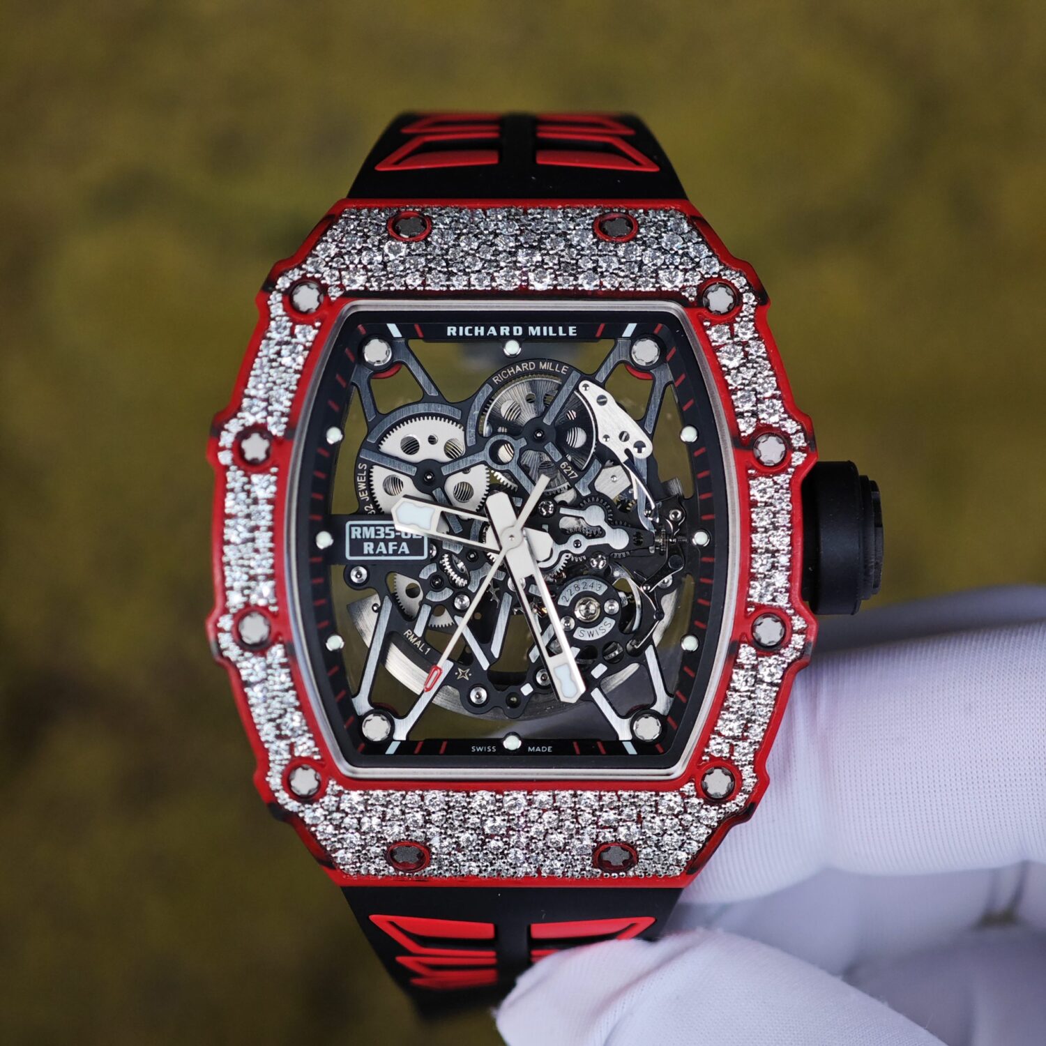 Richard Mille RM35-02 Snowflake Diamond Edition, featuring a modified base Parmigiani movement, custom imported red carbon fiber case, hand-set natural diamonds, custom black and red rubber strap, and a reference-accuratecustom titanium buckle. — custom-built watch
