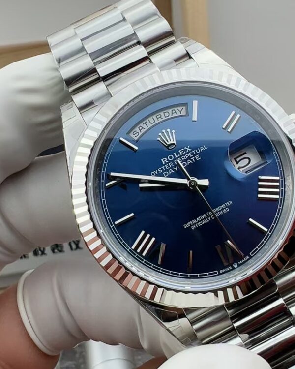 VS Rolex Weekly Journal Blue Disc Roman Numerals 228239 Steel Band Blue Disc